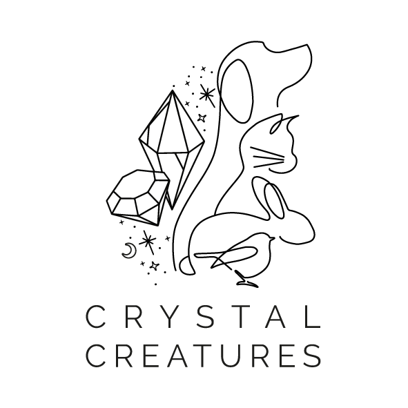 Crystal Creatures Logo - Black outline of a dog, cat, rabbit and bird with crystals and stars on white background.