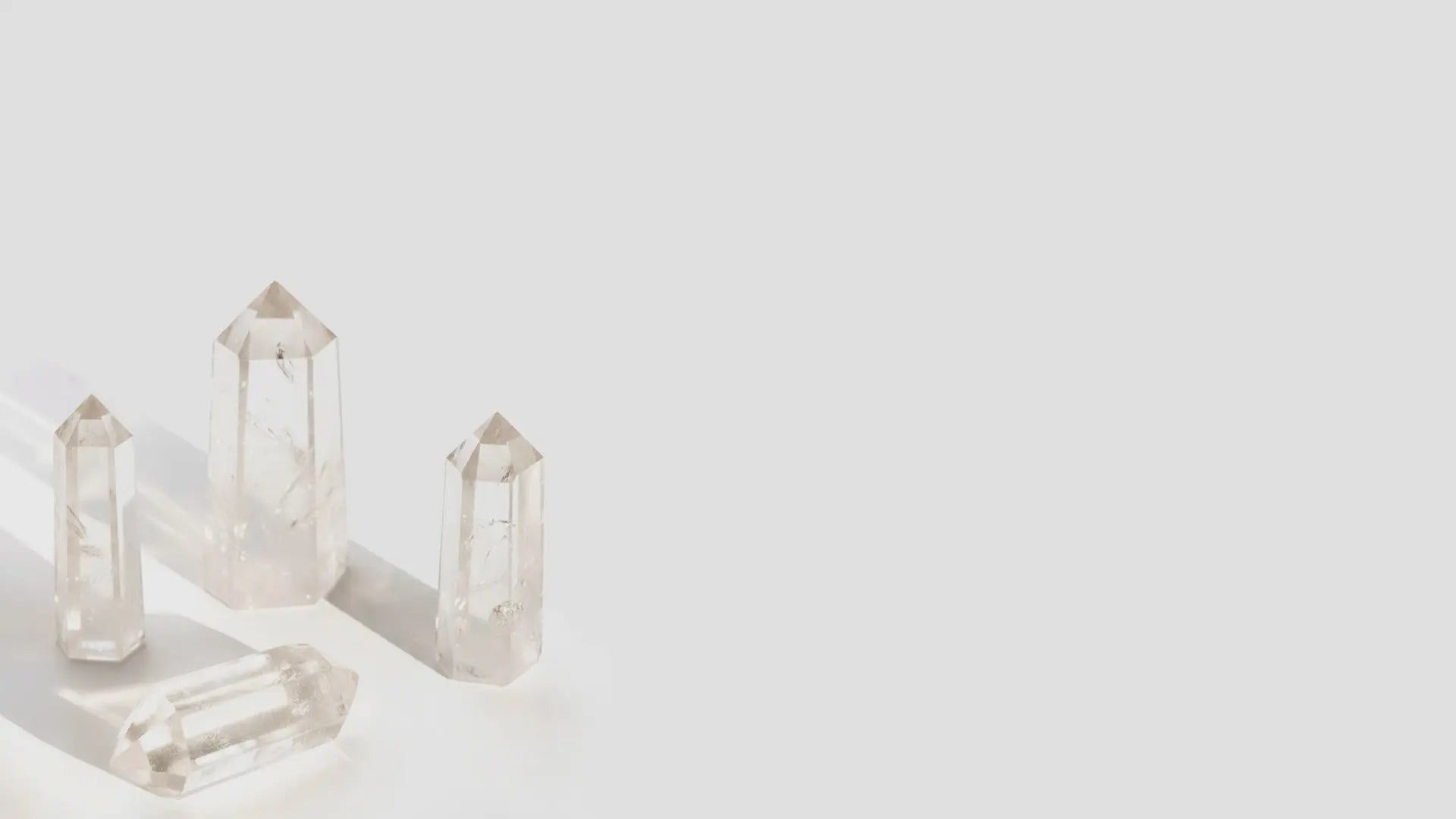 Clear crystal objects on a white background