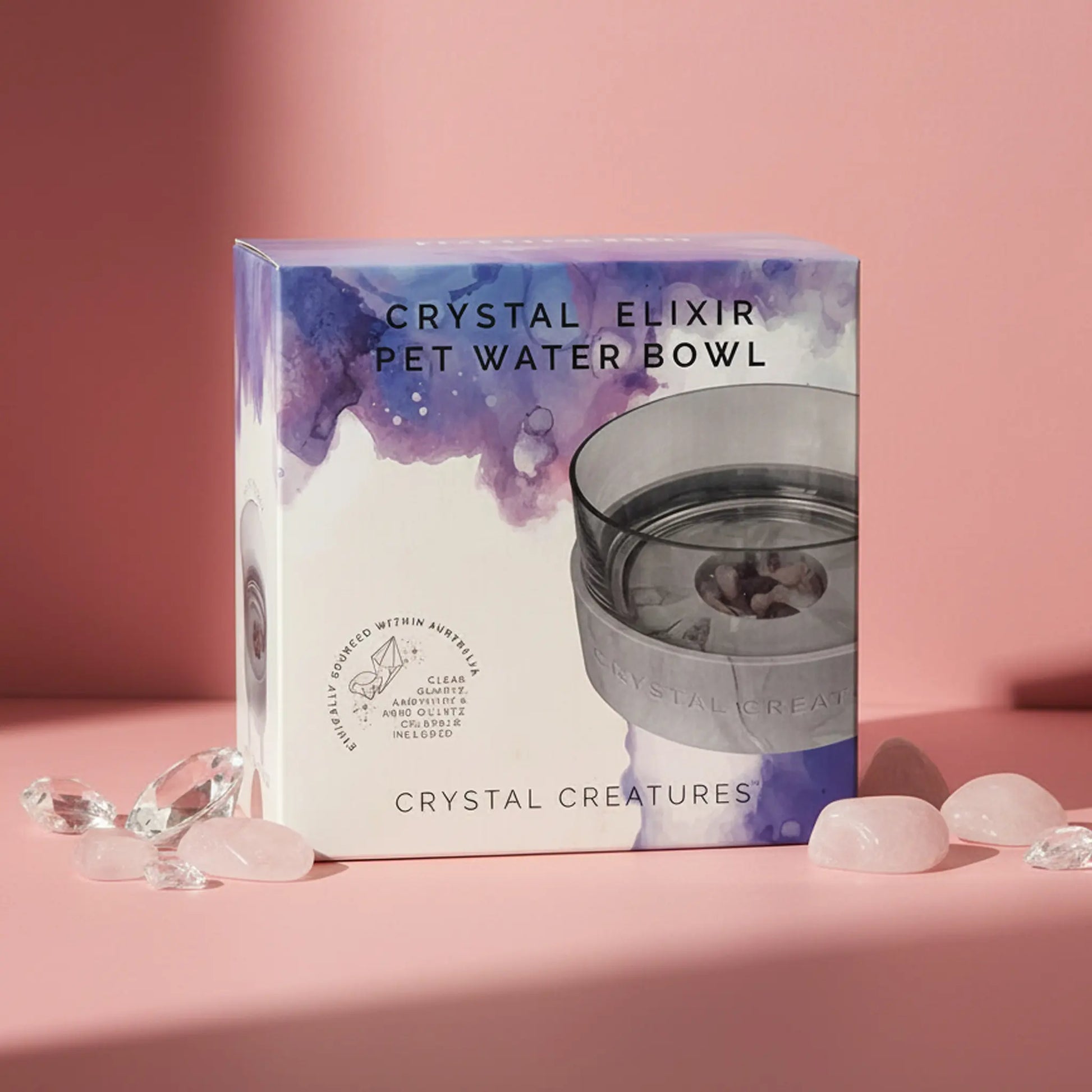 Box for Crystal Elixir Pet Water Bowl with crystals on a pink background